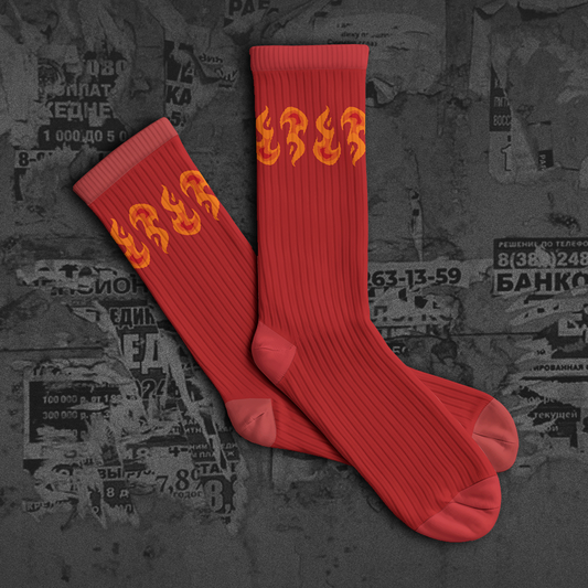 Red socks with flame design on a dark background with text and numbers.
