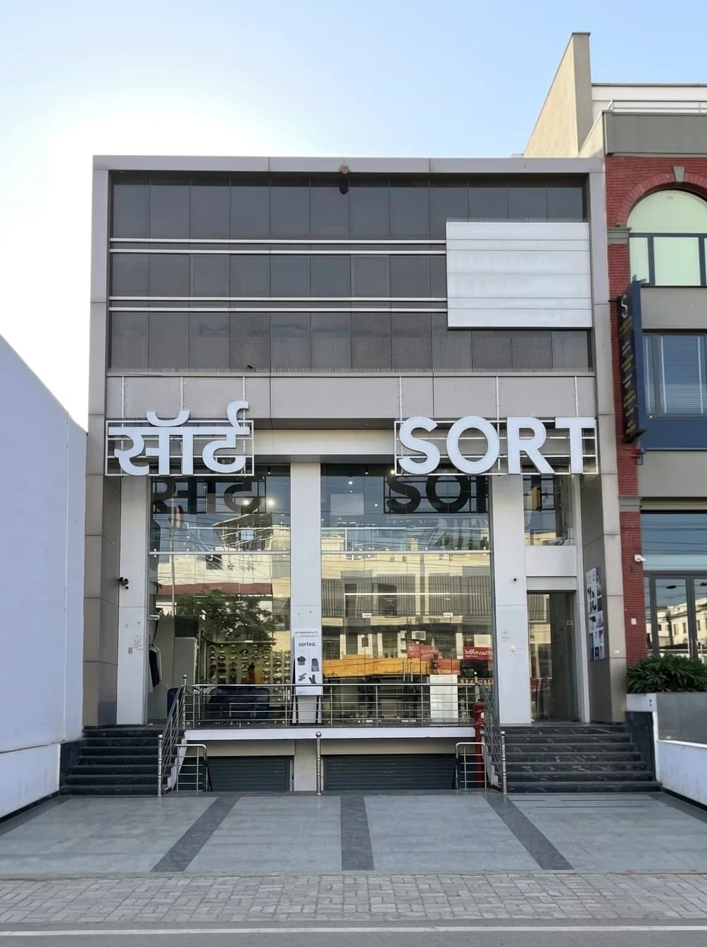 SORT Mansarovar storefront exterior facade